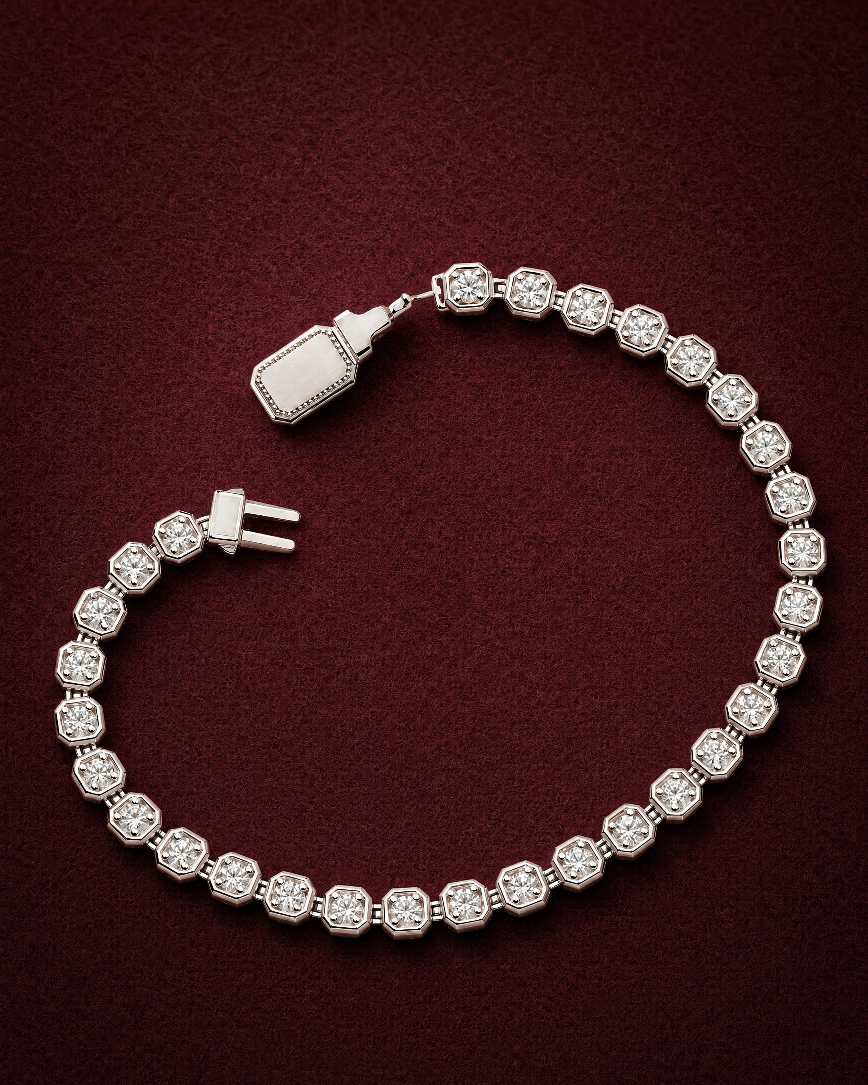Riviera Tennis Bracelet in 14k white gold with diamonds in octagonal collets, on garnet jeweler's felt